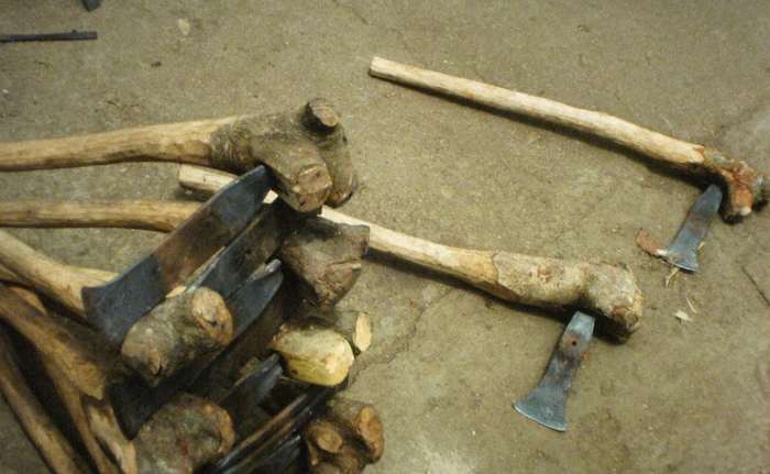 axes in Nigeria photo of axes with rough wooden handles